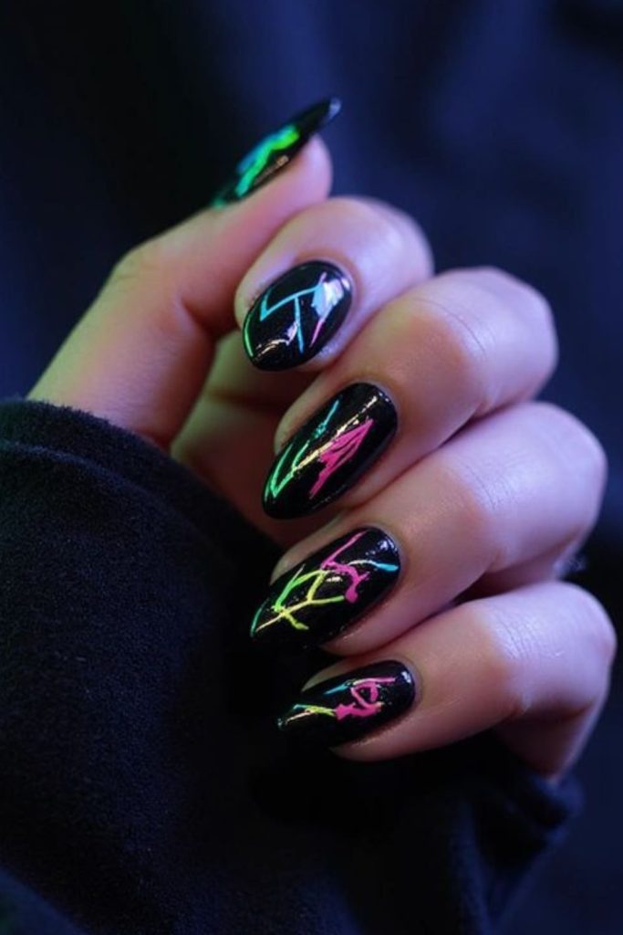 Black nails with chaotic neon streaks