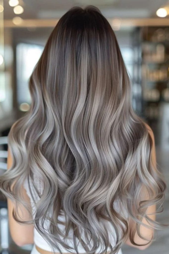 Long dark hair ash highlights.