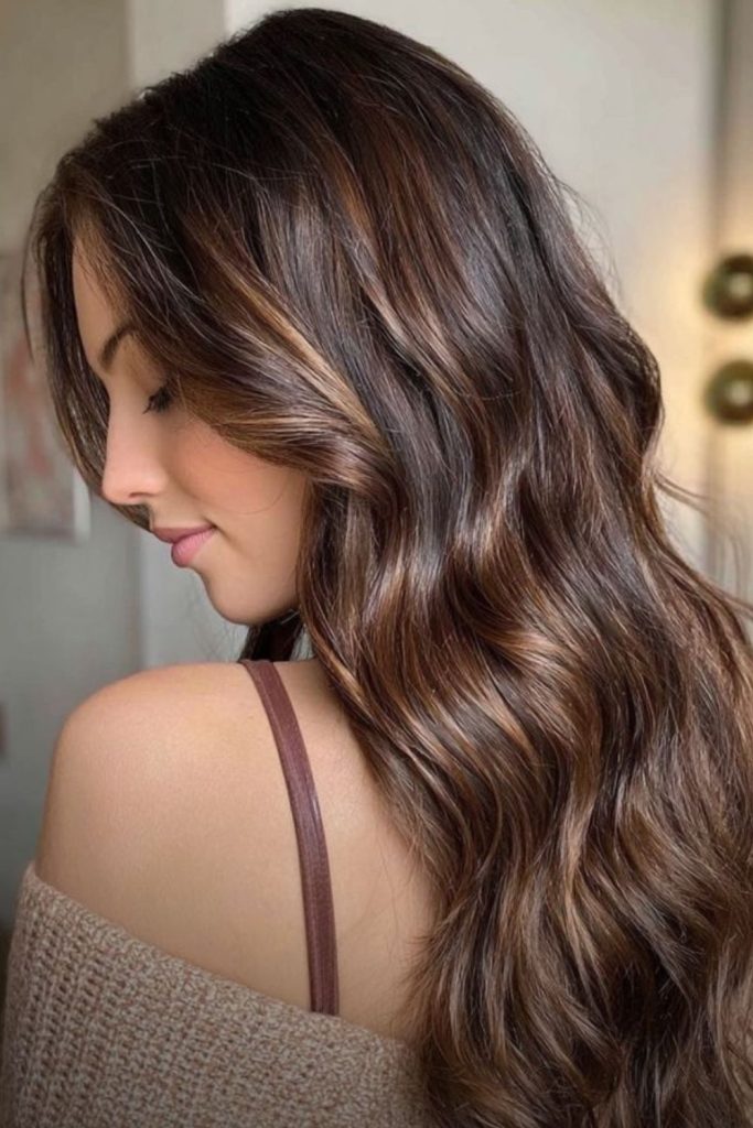 Bronze whispers on mocha brown layered hair.