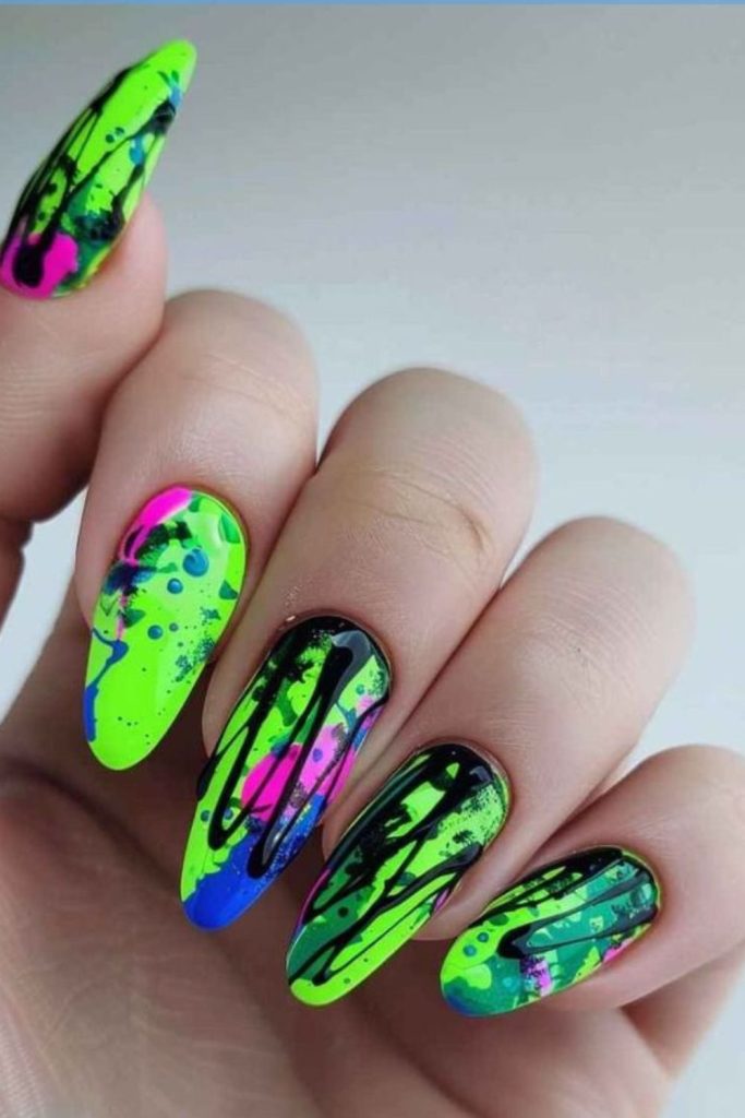 Neon ink splatter nail art