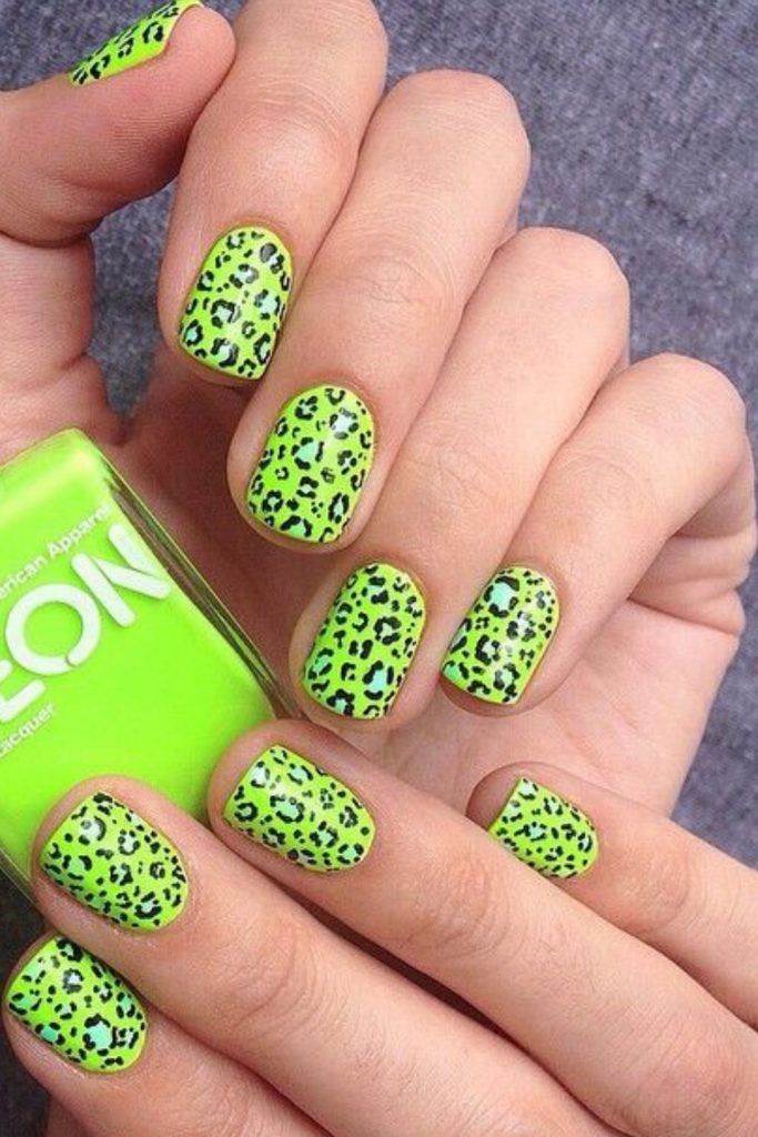 Lime animal print wild nail design