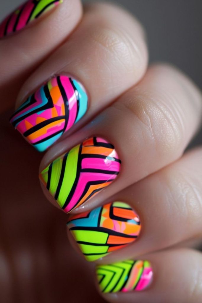 Bright neon streaks on pastel nails