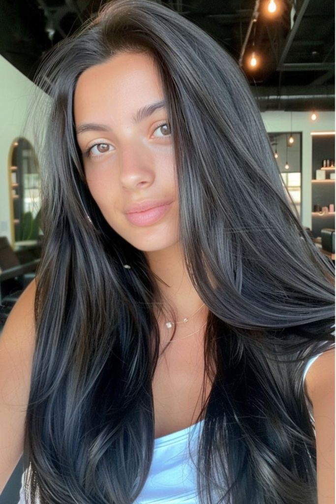 Dark glossy hair flowing gracefully downward