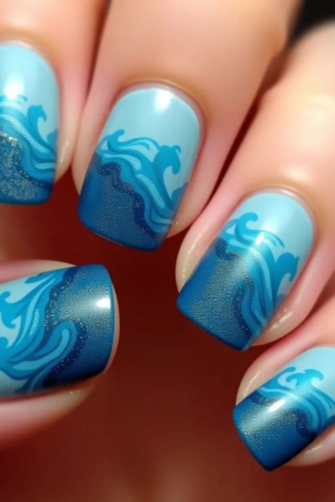 Aqua nails with sparkling wave accents.