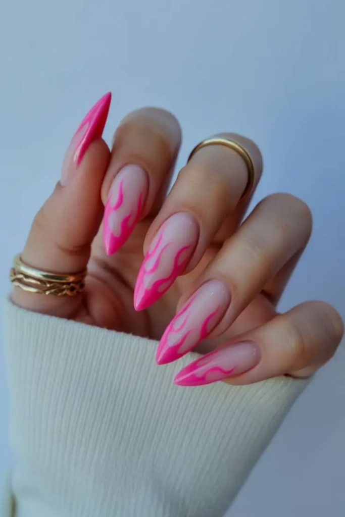 Pastel flame art on milky nails.