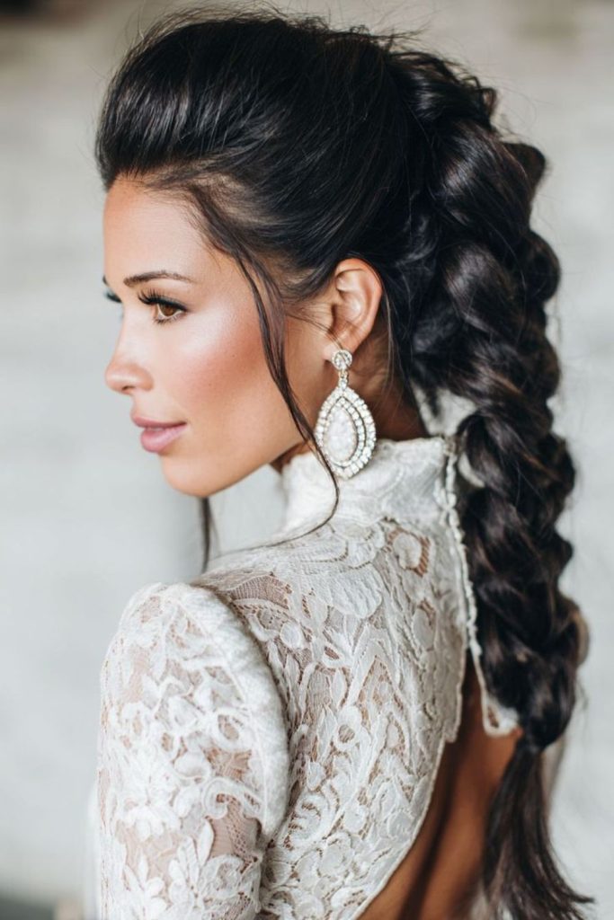 Dark dramatic wing-like braids