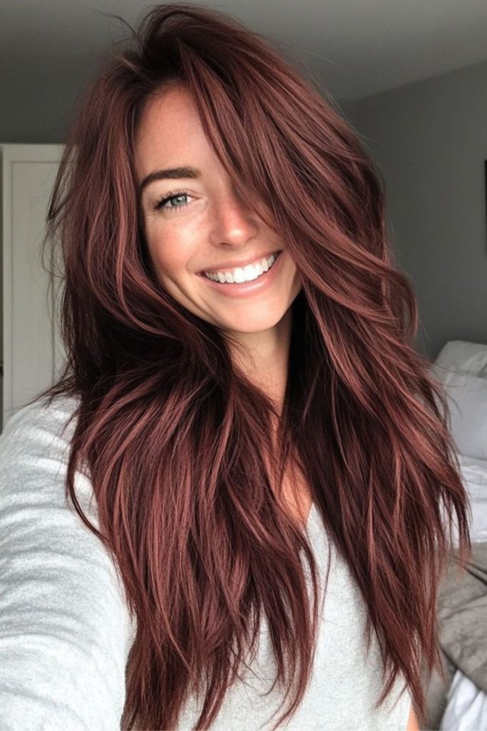 Rosewood textured red brown haircut style.