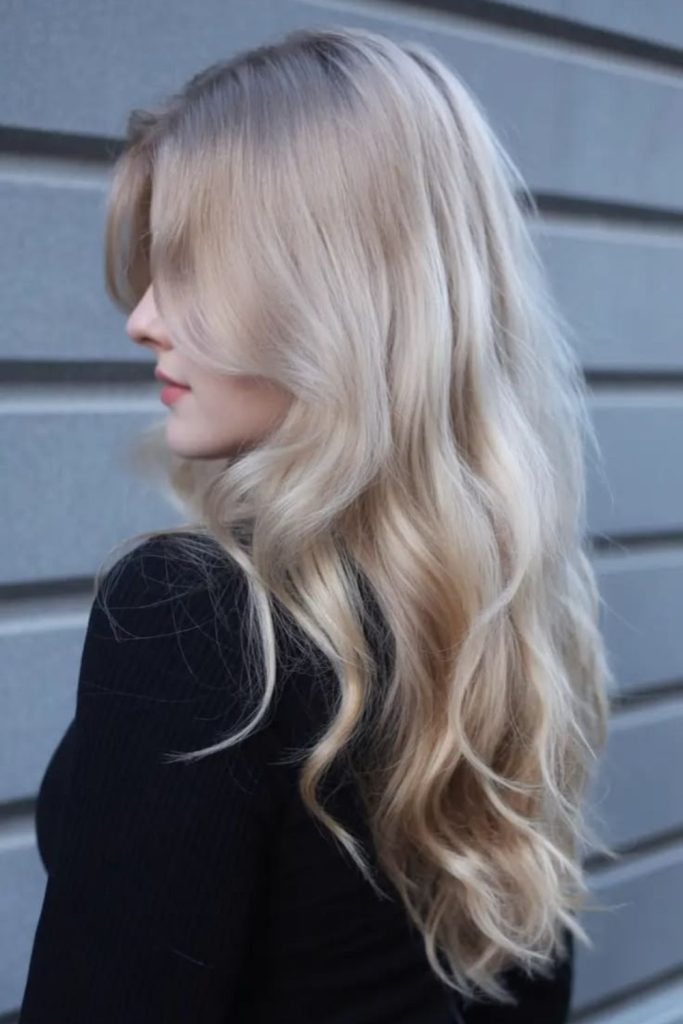 Flowing platinum hair with ethereal glow