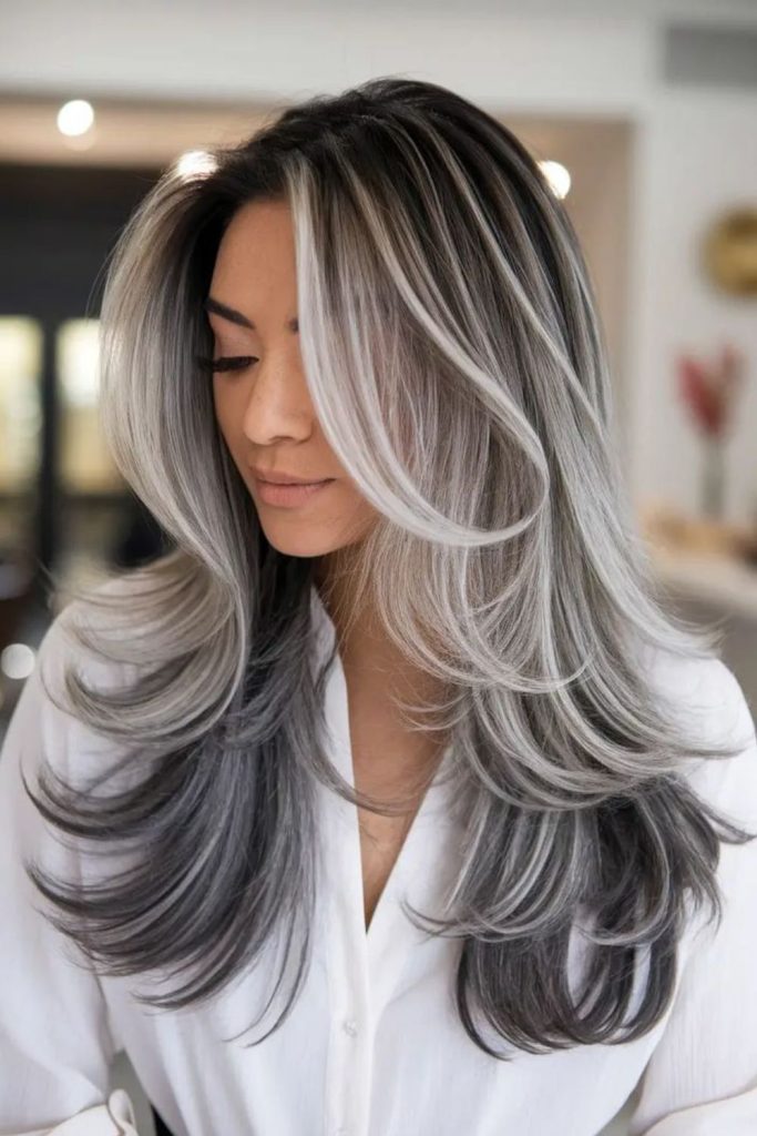 Soft ash blonde layered highlights.