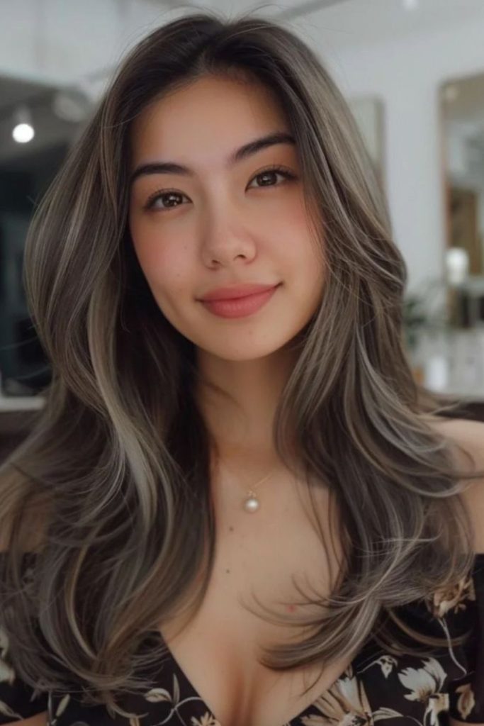 Curtain bangs with ash blonde highlights