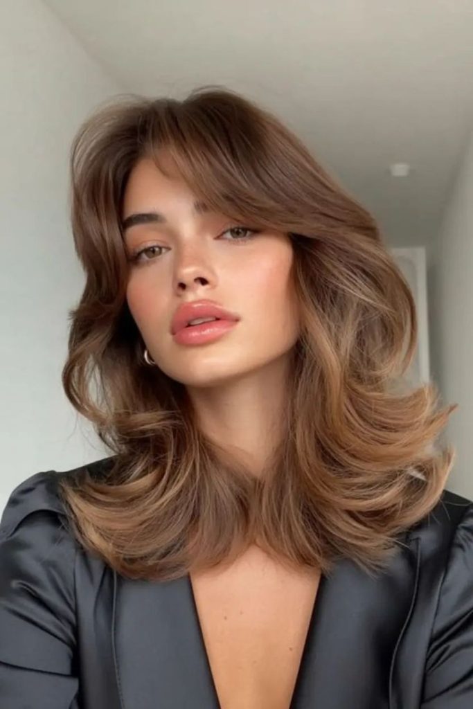 Smoky layered soft volume modern hairstyle