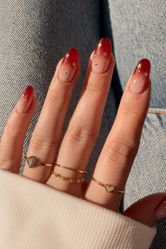 Crimson gold nails night sky sparkle