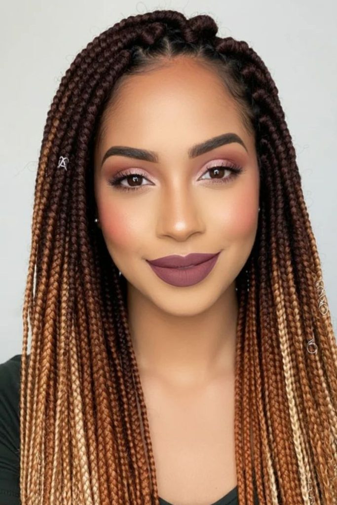 Gradient sunset-toned flowing braids