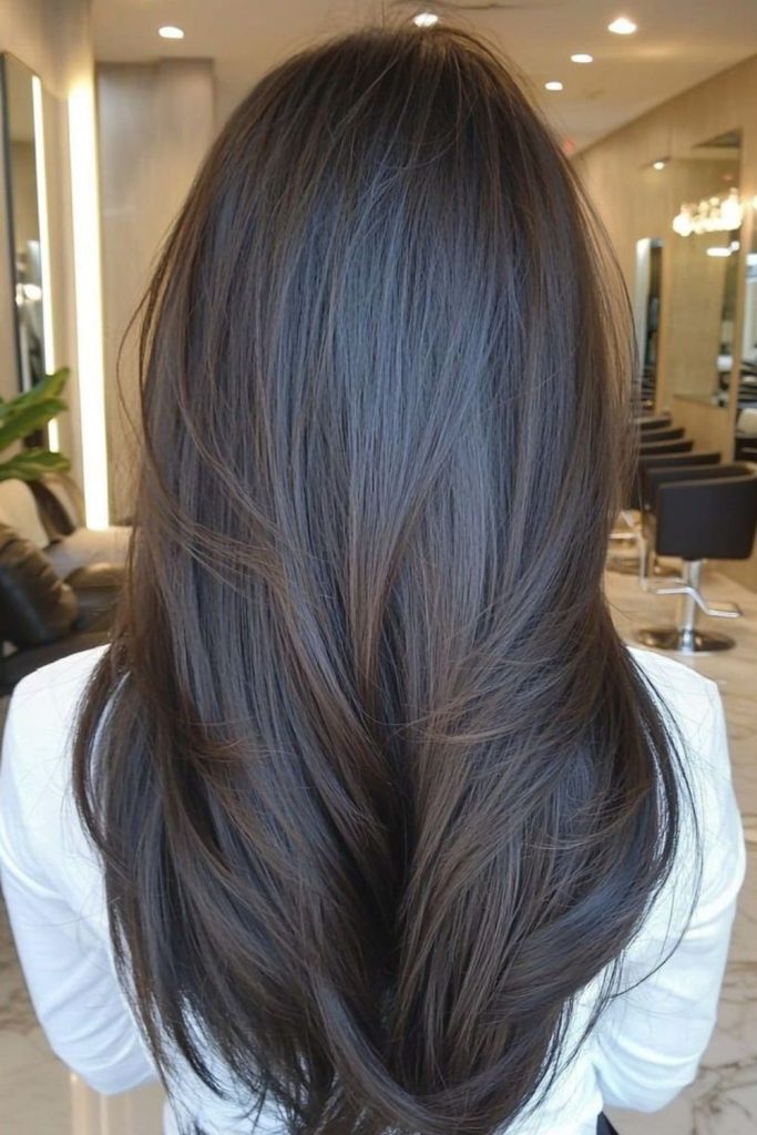 Dark chocolate hair with soft layers