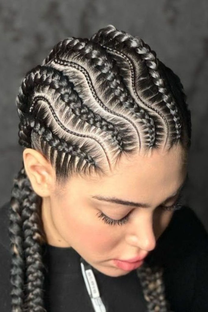 Zigzag parted straight back braids design.