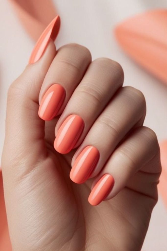 Floral blush orange delicate spring nails.