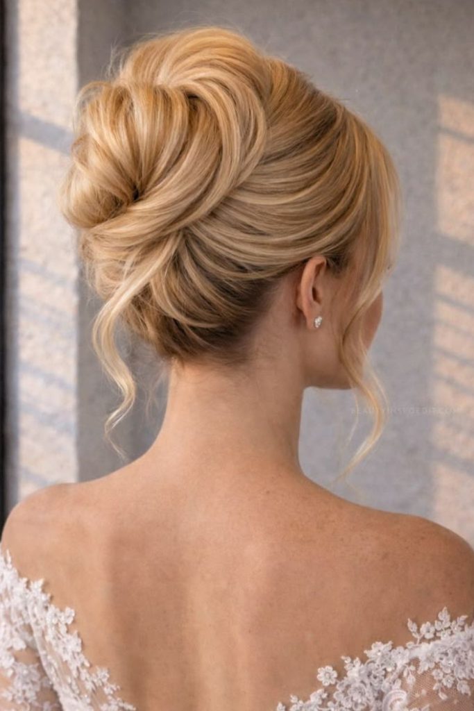 High airy bun lifted bridal elegance