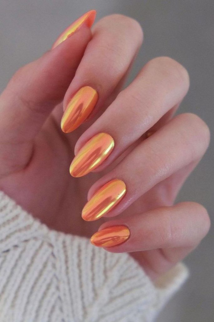 Burnt peach aura gradient glossy nails.