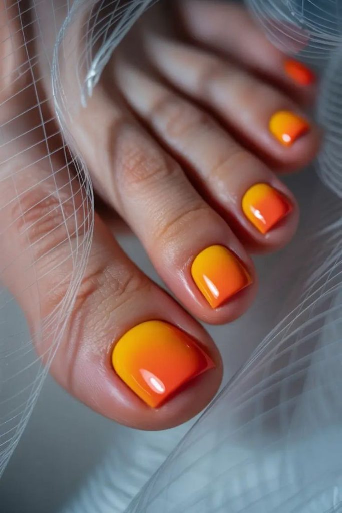 Bright citrus swirl vibrant toenail art