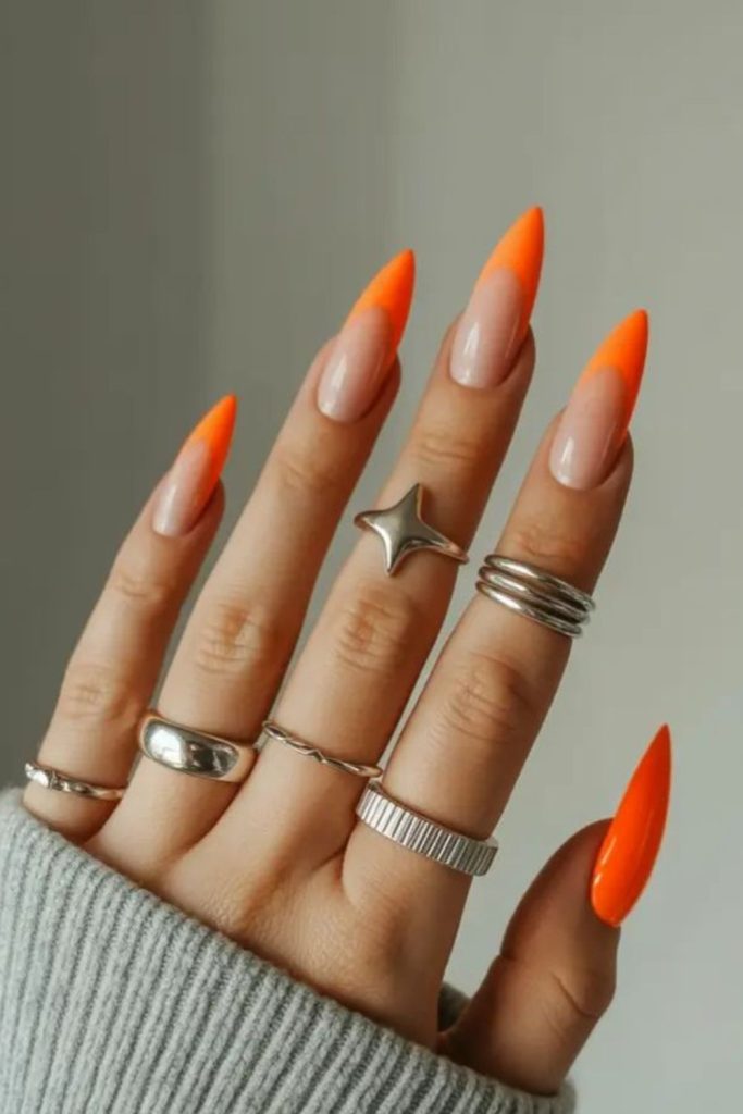 Coral flame French tip creative nails.