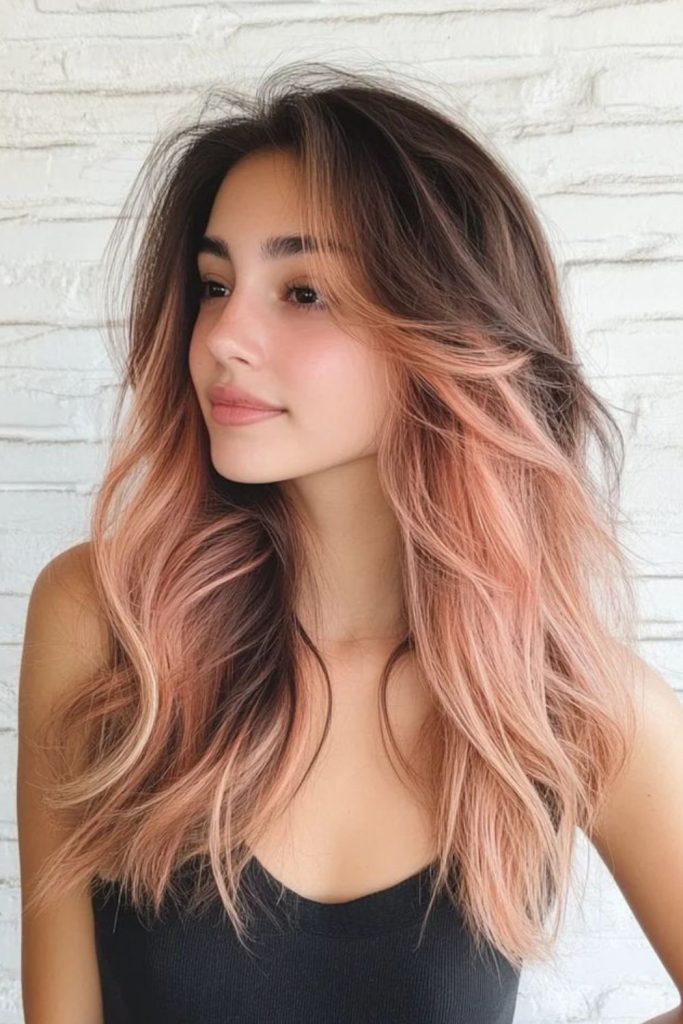 Layered coral texture wavy dimensional hair.