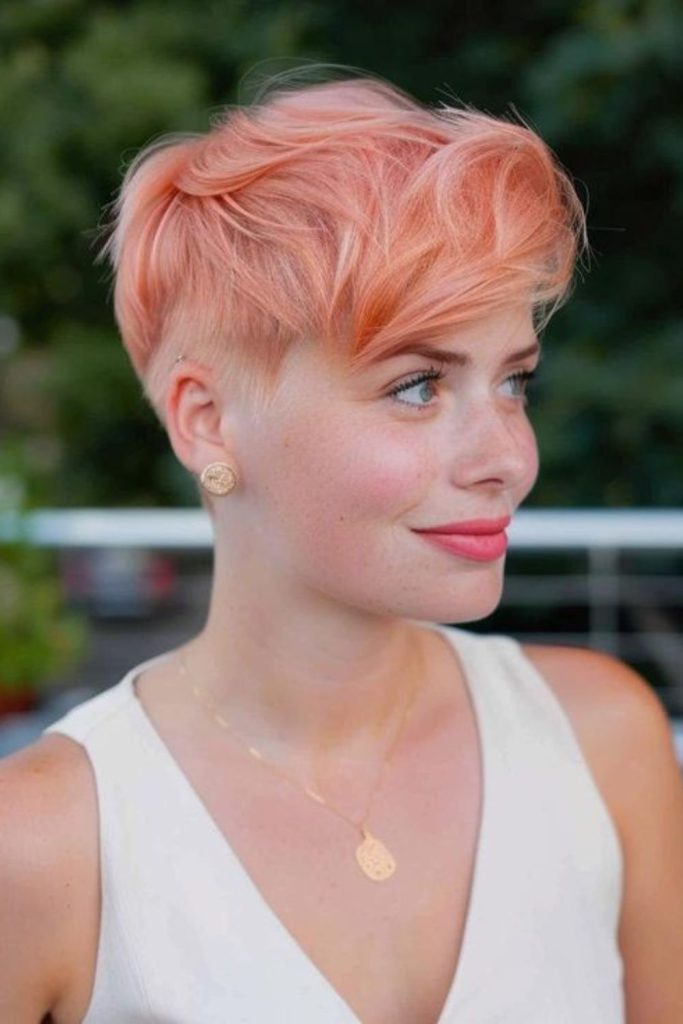 Coral snip pixie glow short pixie cut warm coral tone