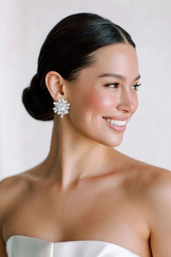 Sleek bun with crystal shine finish