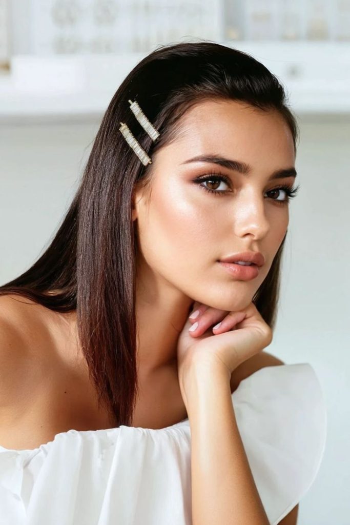 Sleek sharp part modern bridal hair