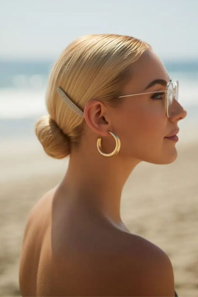 Sleek side bun beachy pool vibe.