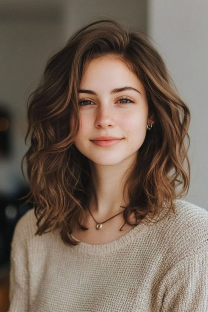 Driftwood textured medium natural layered hair.