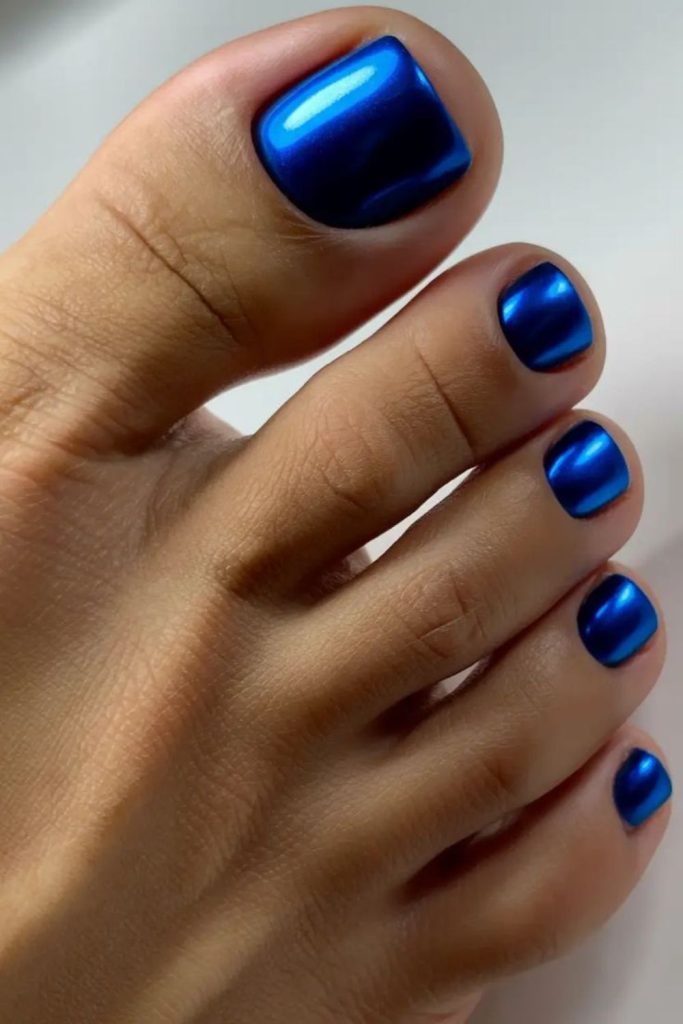 Electric blue flame edgy toenail design