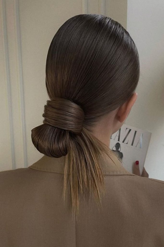 Folded back chignon refined formal look