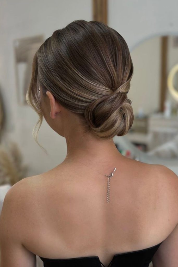 Side swept chignon graceful formal look