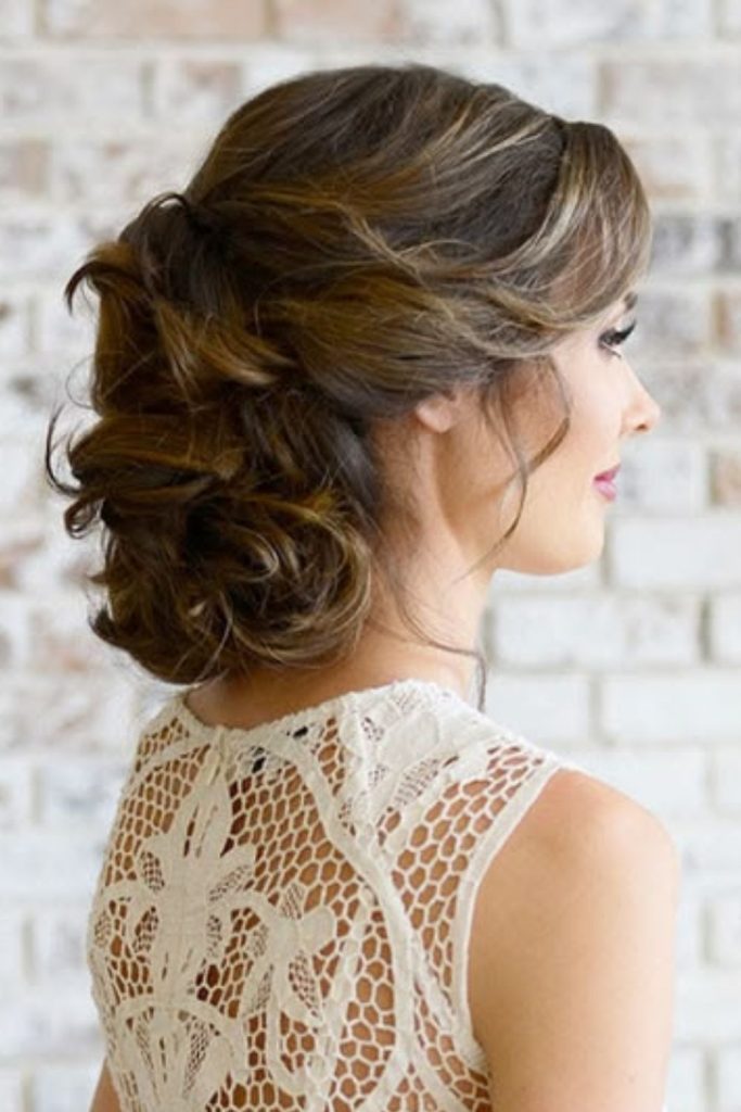Feathered layered updo soft airy look