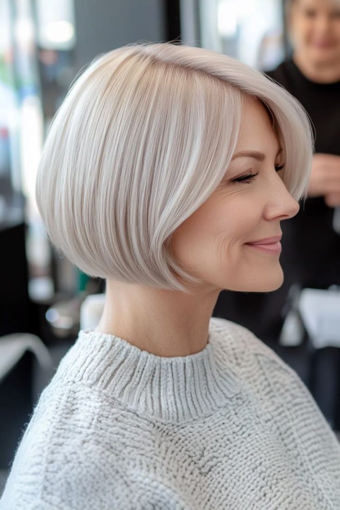 Sleek micro bob polished chin length cut