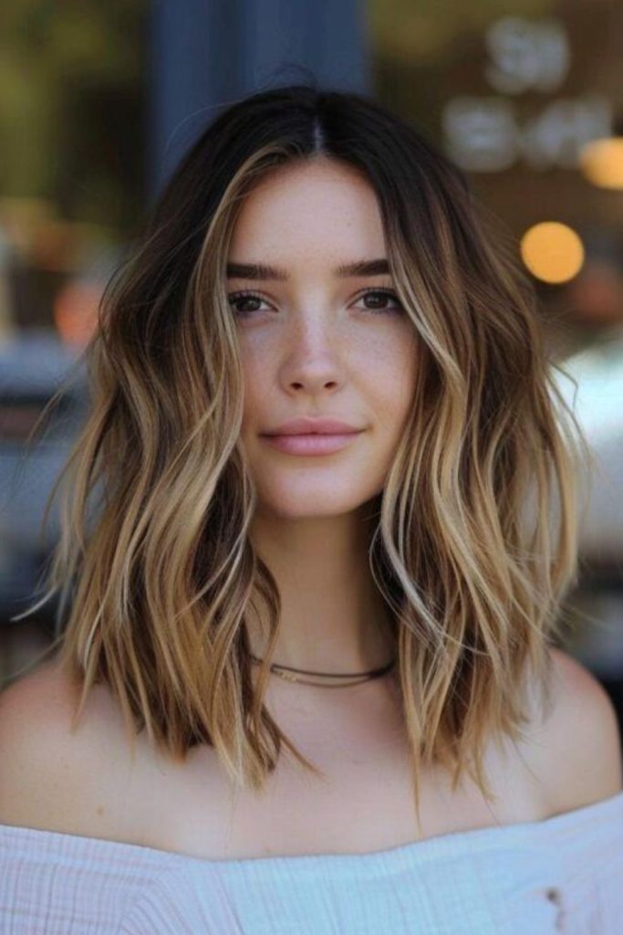 Meadow flip lob cut breezy short haircut soft outward ends