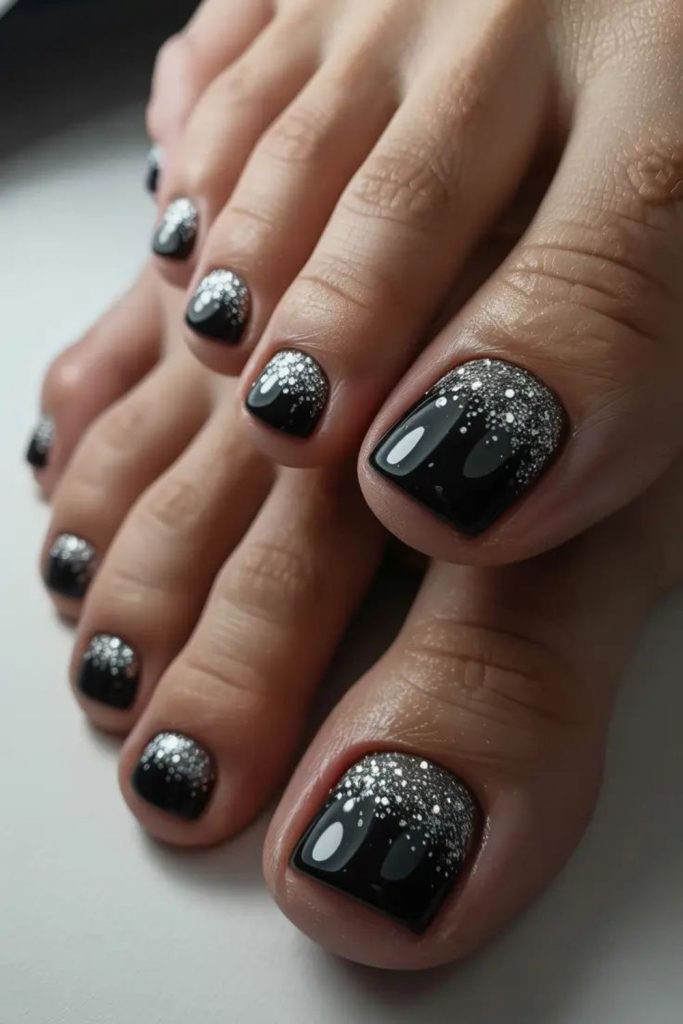 Midnight glitter fade dark toenail design