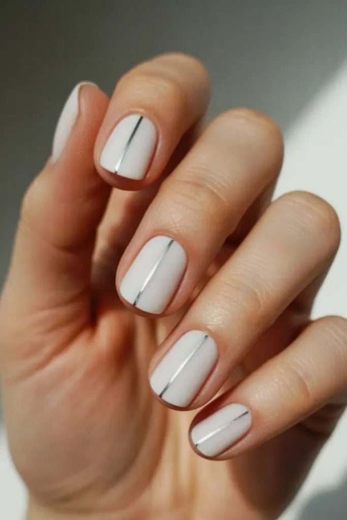 Minimal vertical stripe nail design