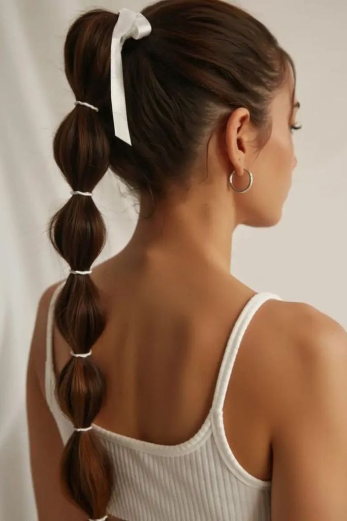Moonlit bubble ponytail playful structured graduation style