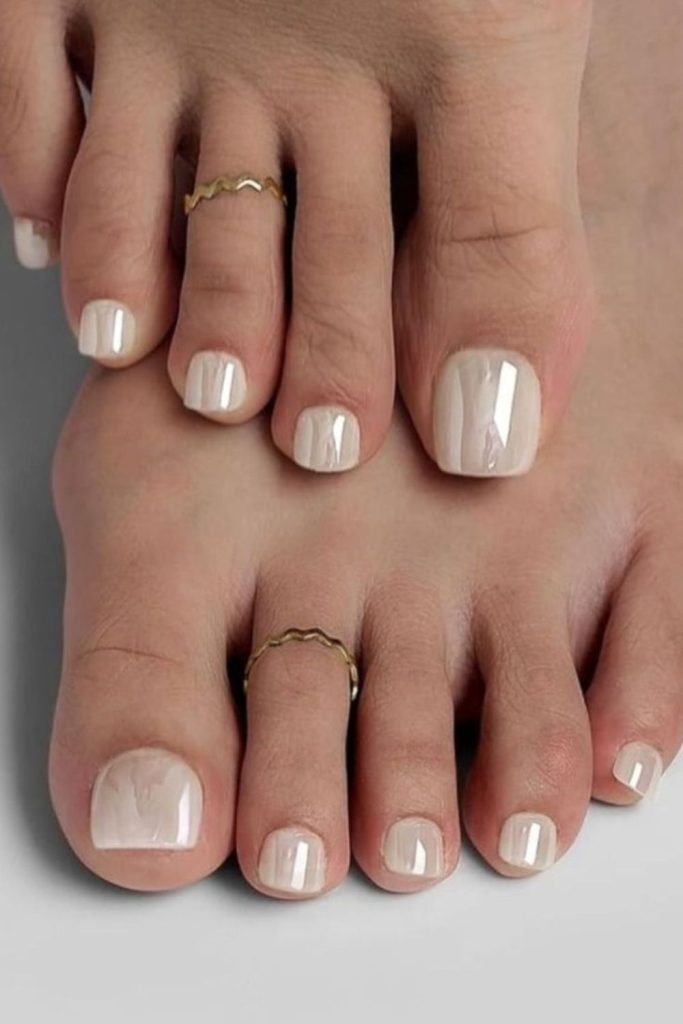 Soft pearl ivory elegant toenail design