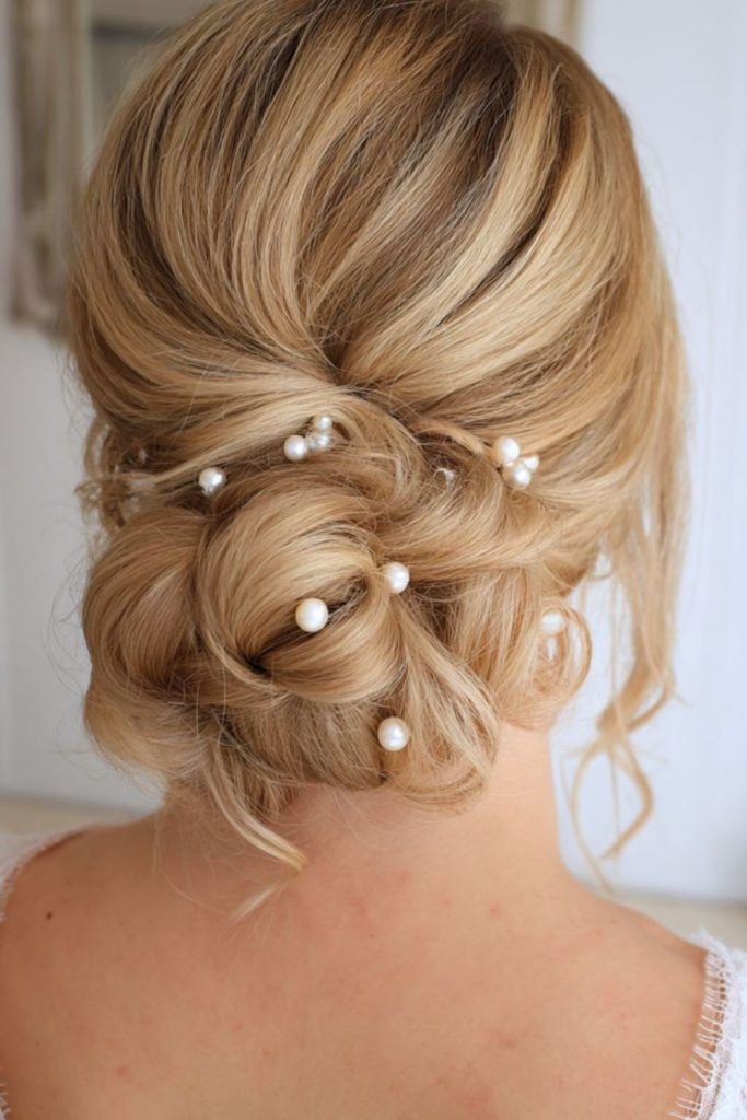 Pearl accented loose messy bun