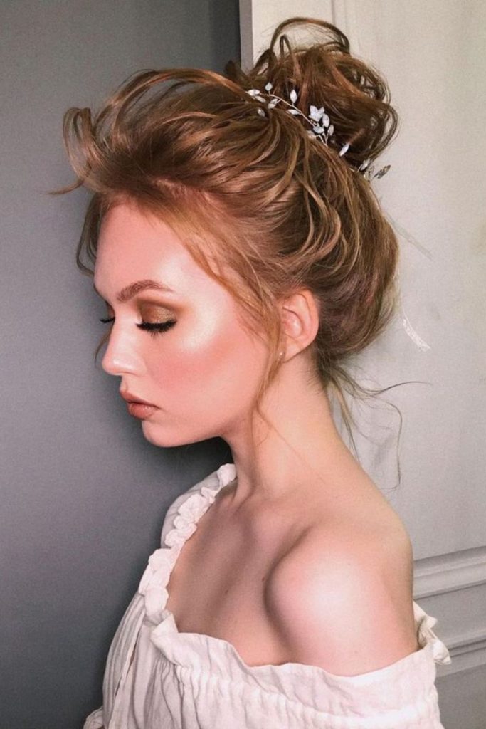 Regal high twist bun structured elegance