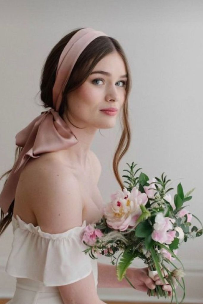 Smooth crown wrap sleek bridal updo