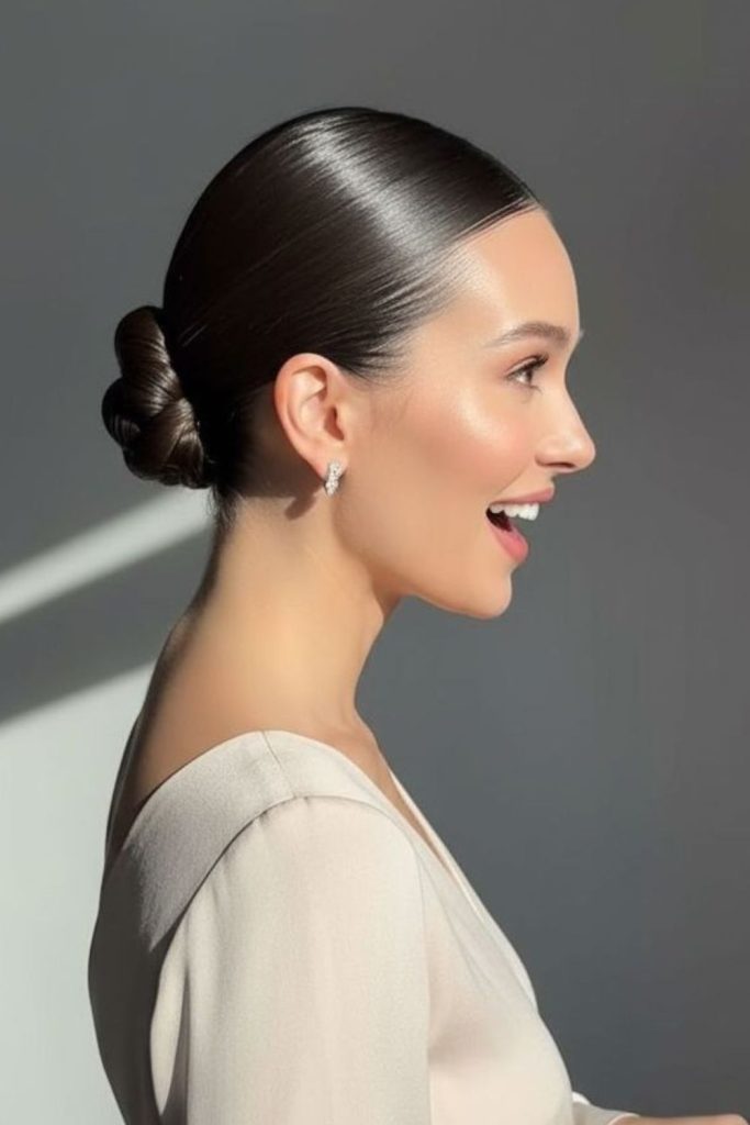 Polished low bun medium formal hairstyle