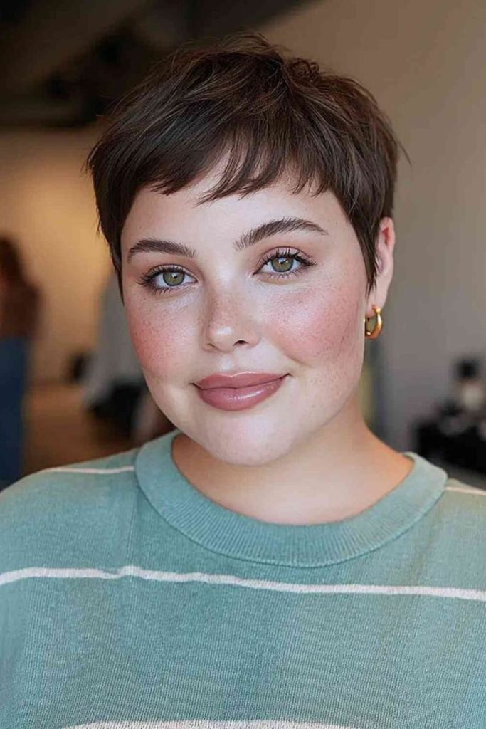 Airy textured pixie haircut soft feathered layers