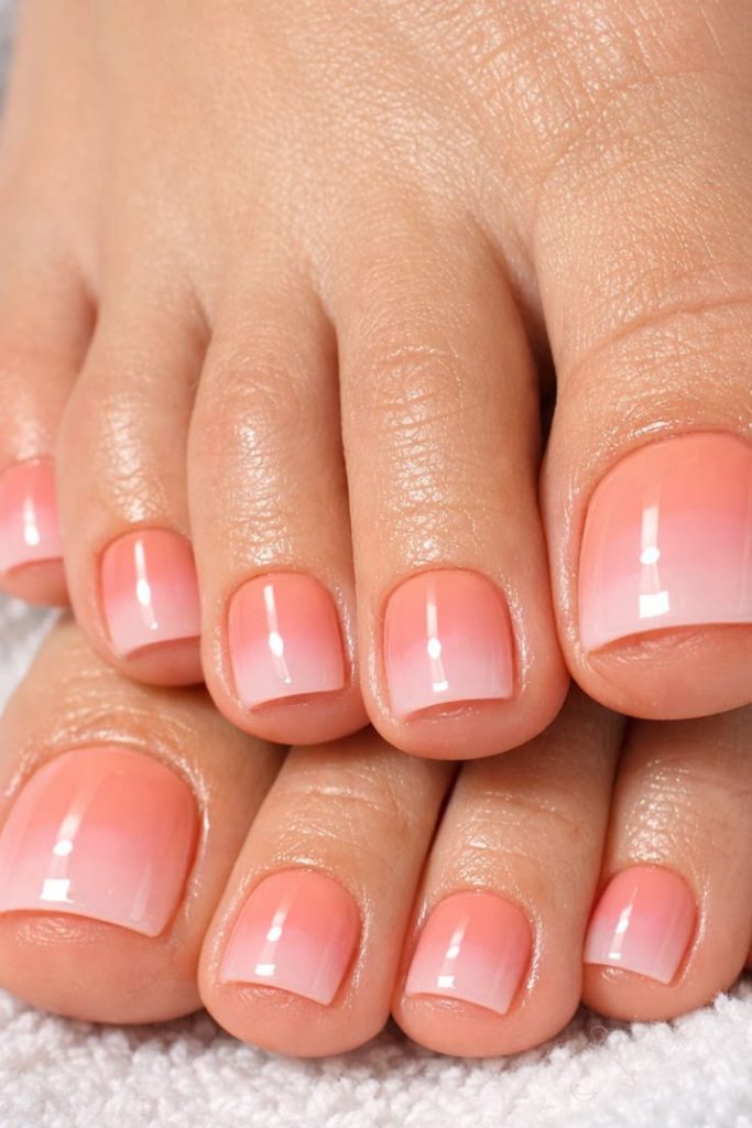 Soft peach summer toe nails