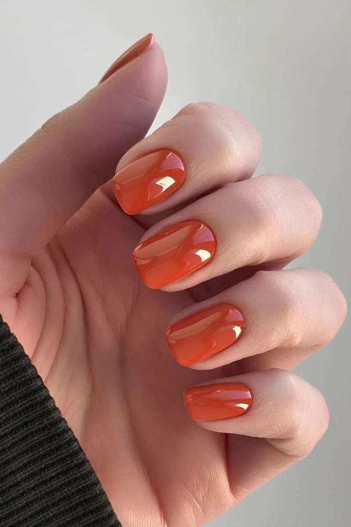Tangerine grid geometric matte stylish nails.