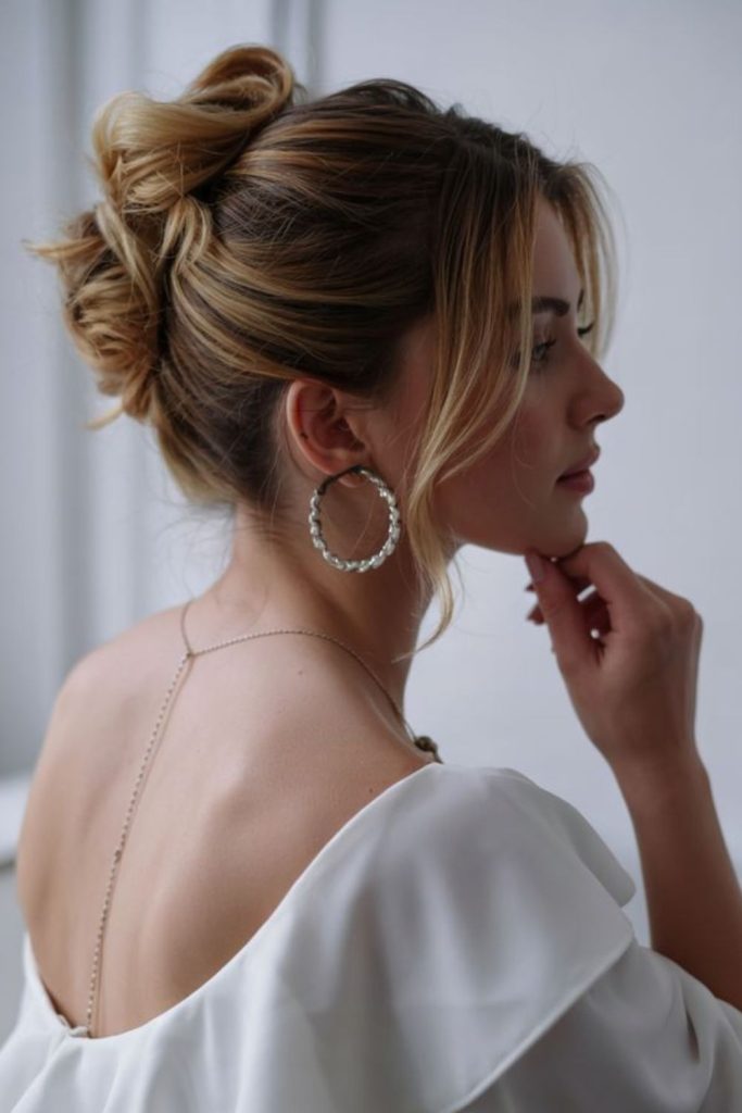 Twisted halo updo soft elegant style.