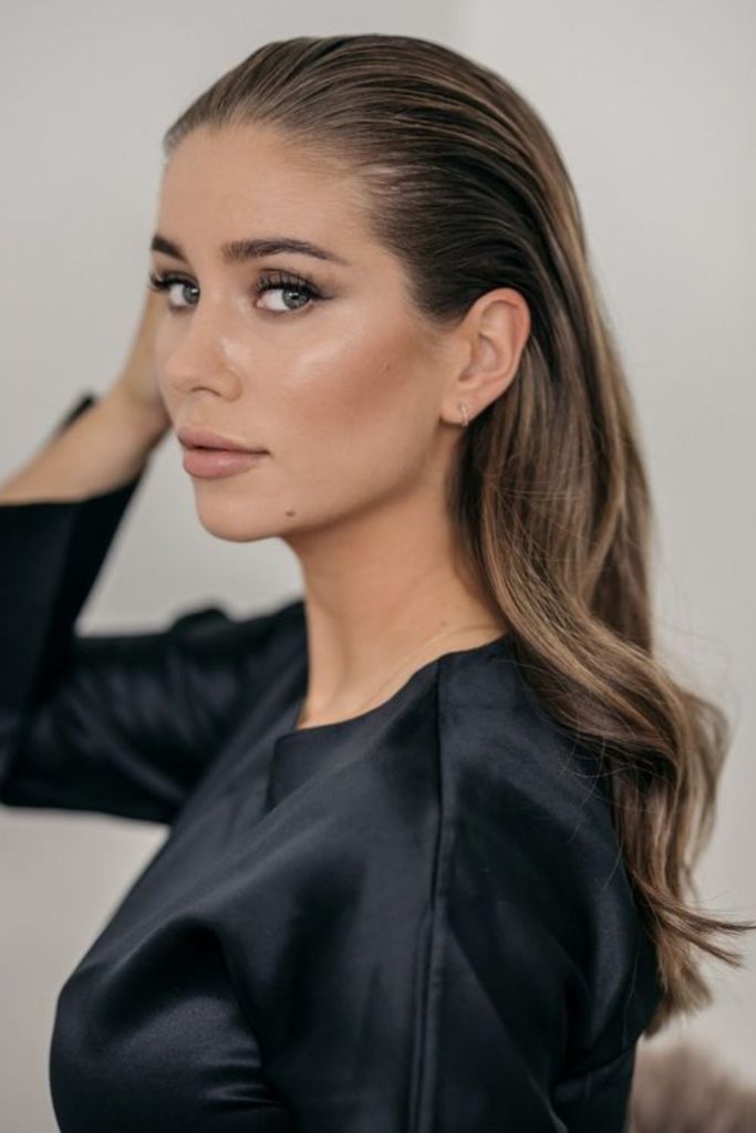 Wet look sculpted glossy wave hair