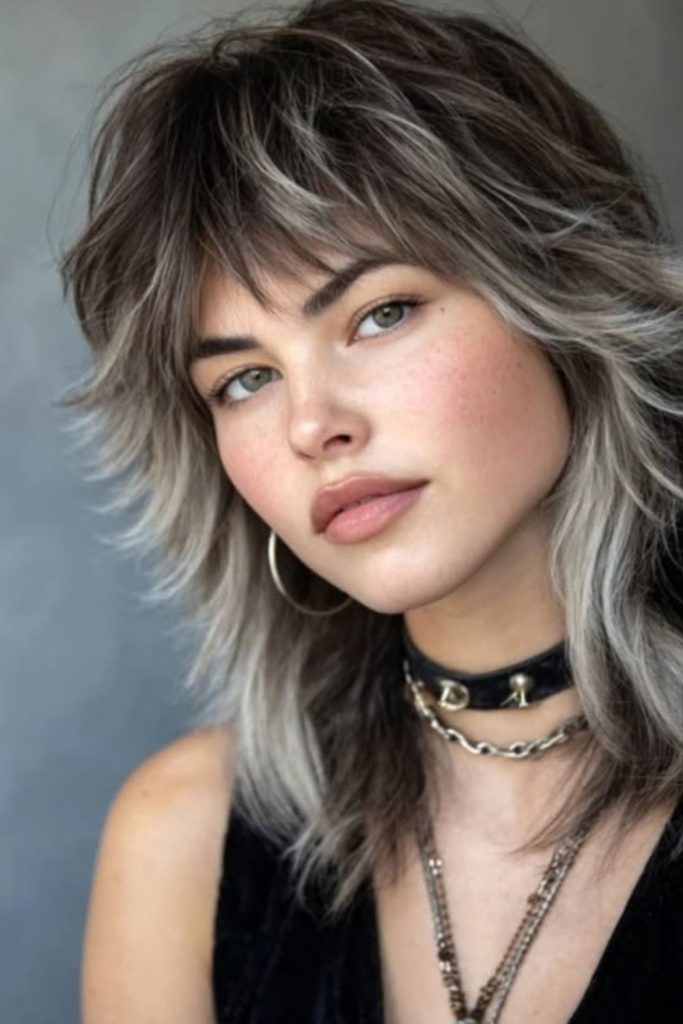 Wild Ember wolf cut shaggy layers.